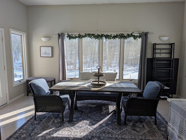 dining space with baseboards