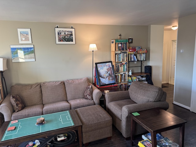 living room with dark wood-type flooring