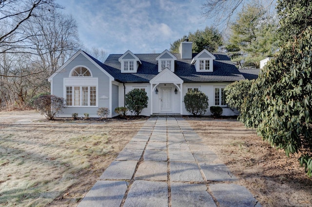 view of new england style home