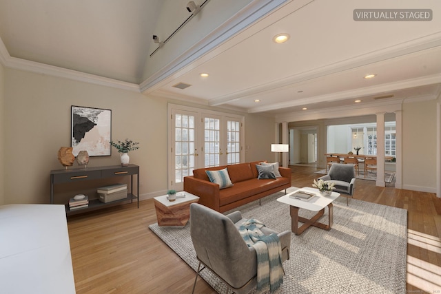 living room with french doors, ornate columns, crown molding, beam ceiling, and light hardwood / wood-style flooring