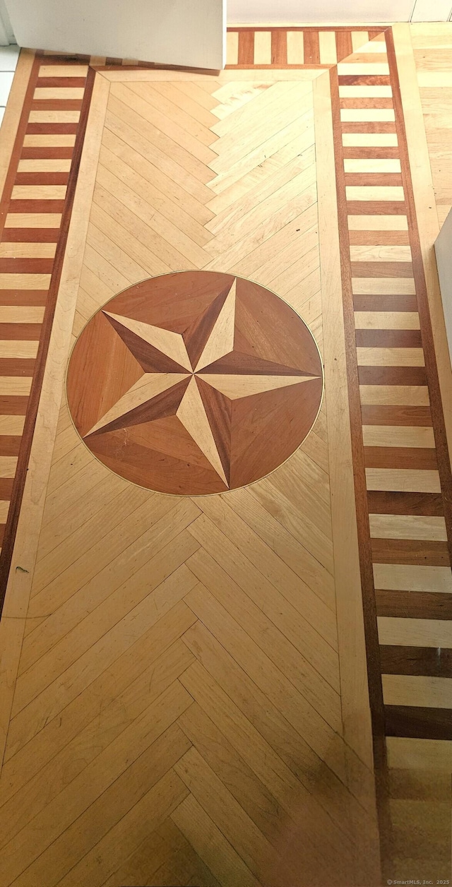 interior details featuring parquet flooring