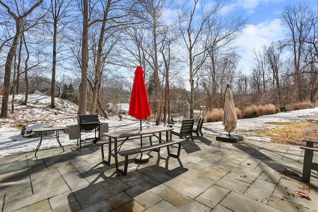 view of snow covered patio