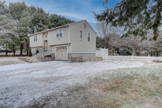 view of front of home featuring a garage