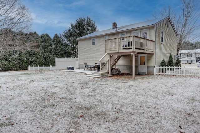 rear view of house with a patio area and a deck