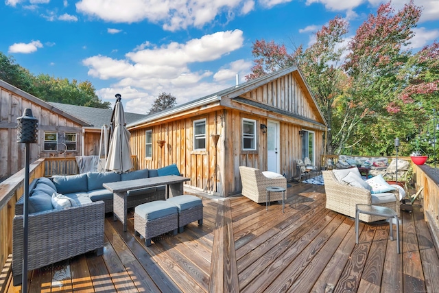 deck featuring outdoor lounge area