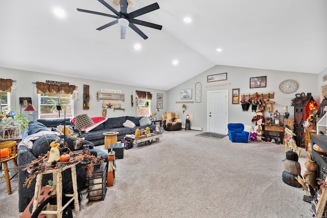 carpeted living room featuring ceiling fan and lofted ceiling