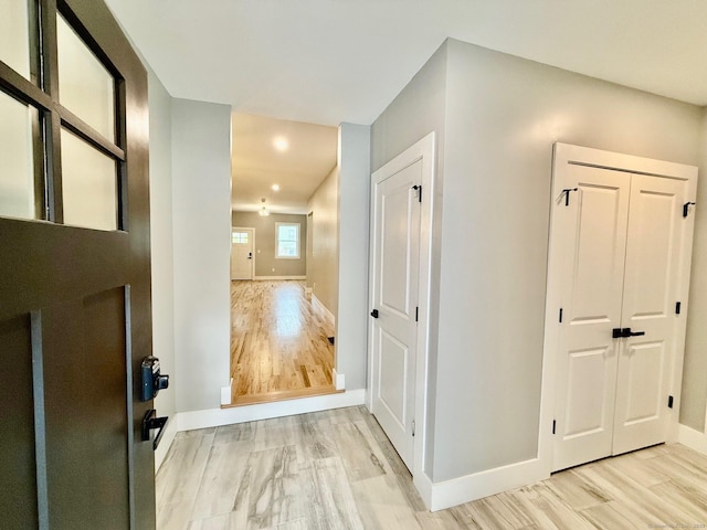 hall featuring light hardwood / wood-style floors