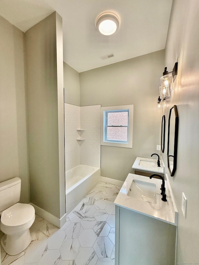 full bathroom with vanity, toilet, and shower / washtub combination