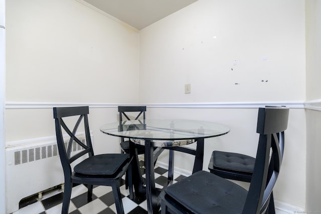 dining room with radiator heating unit