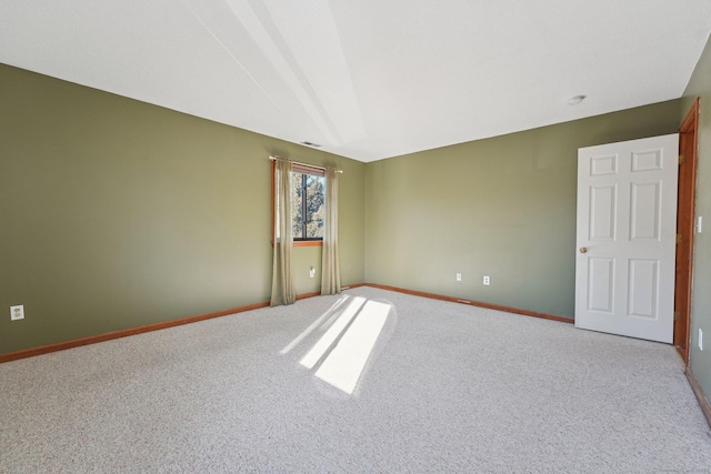 view of carpeted spare room