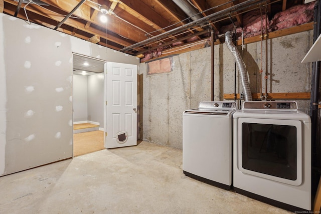 basement featuring washer and clothes dryer