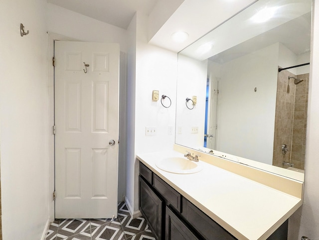 bathroom with vanity and  shower combination