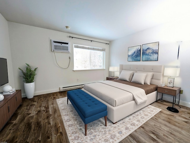 bedroom featuring baseboard heating, wood-type flooring, and a wall mounted AC