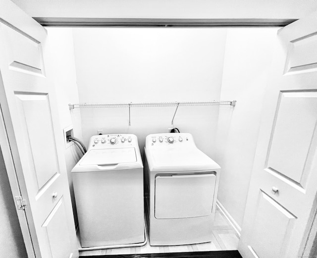 laundry area featuring washer and dryer and laundry area