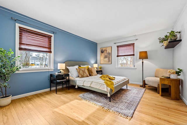 bedroom with light hardwood / wood-style floors