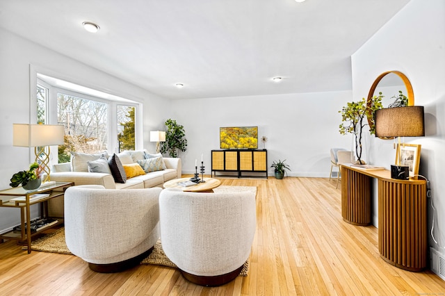 living room featuring light wood-type flooring