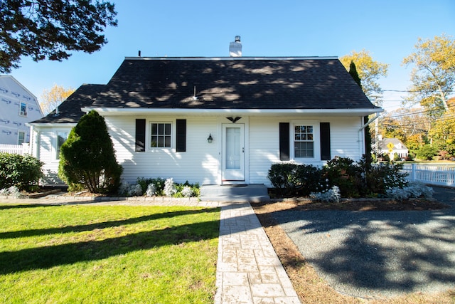 view of front of home with a front yard