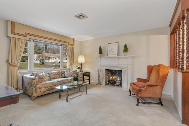 carpeted living room featuring a baseboard heating unit