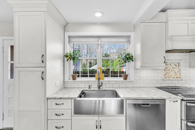 kitchen featuring dishwasher, white cabinetry, and sink