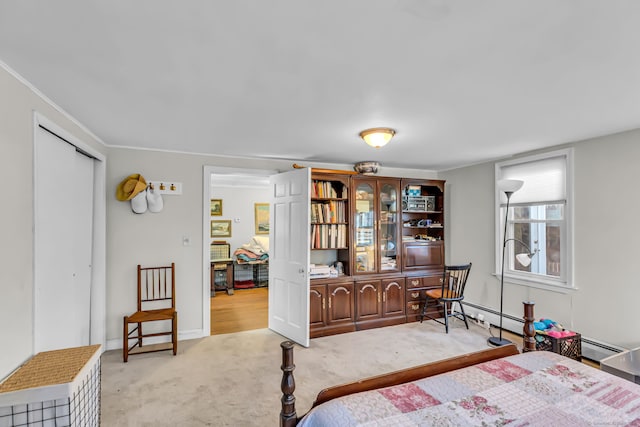 bedroom with light colored carpet