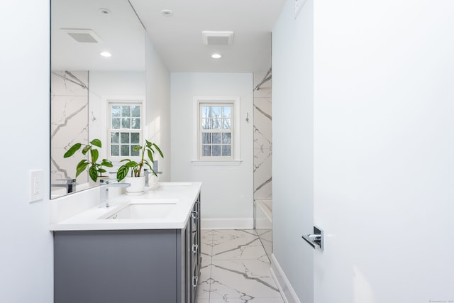 bathroom with shower / washtub combination and vanity