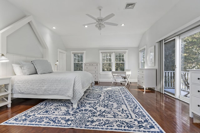 bedroom featuring ceiling fan, vaulted ceiling, access to outside, multiple windows, and dark hardwood / wood-style flooring