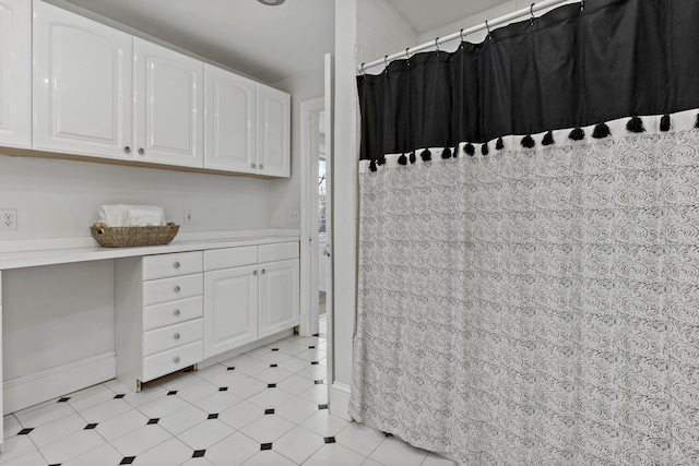 interior space with a shower with curtain