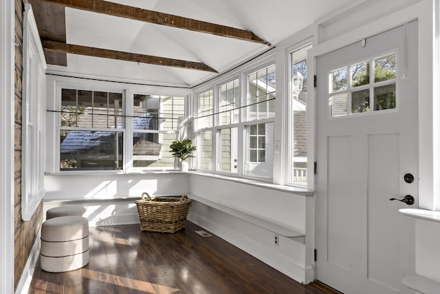 unfurnished sunroom with a wealth of natural light and vaulted ceiling