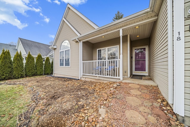 entrance to property with a porch