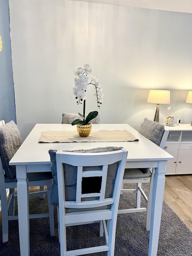 dining space featuring light hardwood / wood-style flooring