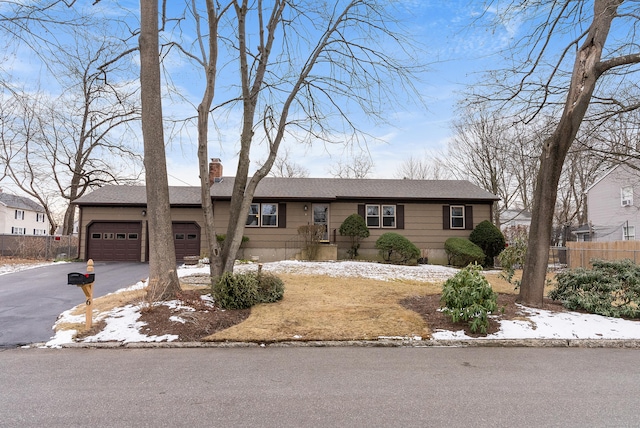 single story home with a garage