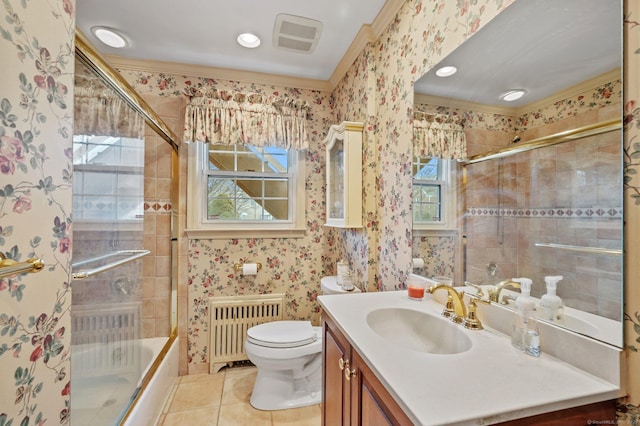 full bathroom featuring radiator heating unit, tile patterned flooring, vanity, toilet, and crown molding