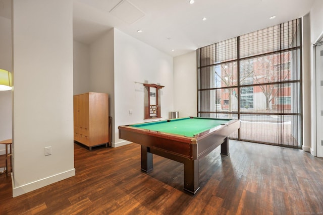 game room featuring dark wood-type flooring, billiards, and floor to ceiling windows