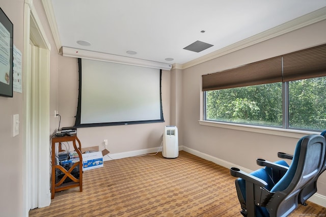 home theater featuring carpet flooring and crown molding