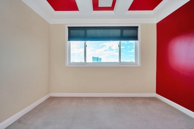 carpeted empty room featuring beamed ceiling, crown molding, and coffered ceiling