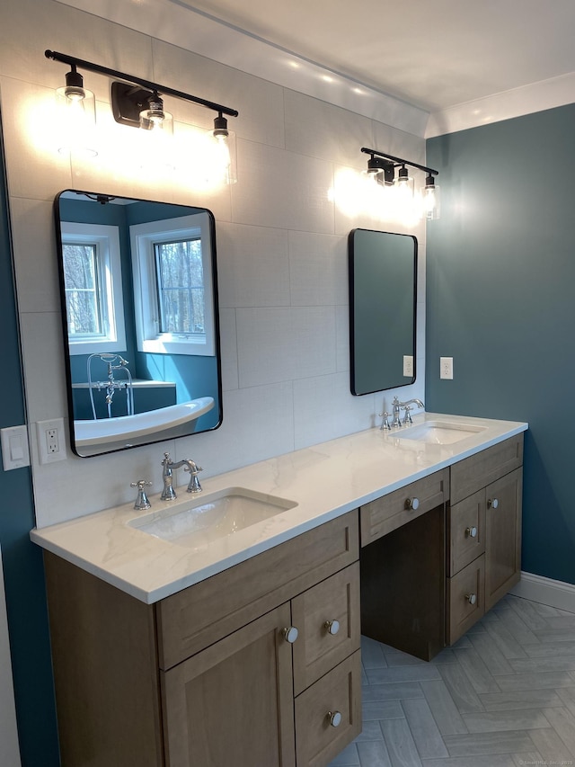 bathroom featuring vanity and parquet flooring