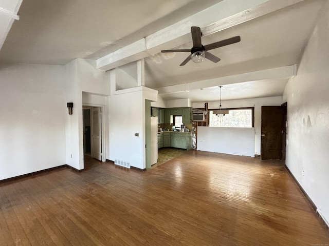 unfurnished living room featuring ceiling fan, vaulted ceiling with beams, and dark wood-type flooring