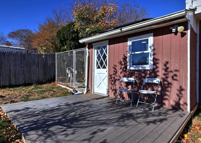 deck with a storage shed