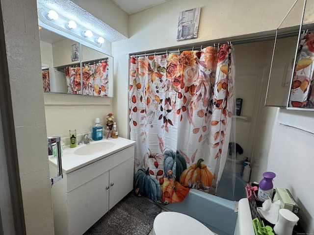 full bathroom featuring shower / tub combo with curtain, vanity, and toilet