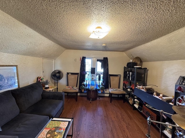 bonus room with vaulted ceiling, dark wood-type flooring, and a textured ceiling