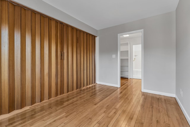 spare room with light hardwood / wood-style floors