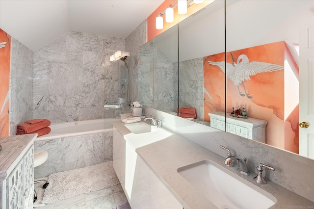 bathroom featuring vanity and vaulted ceiling