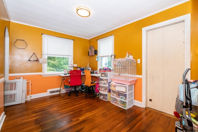 office area featuring ornamental molding and dark wood-type flooring