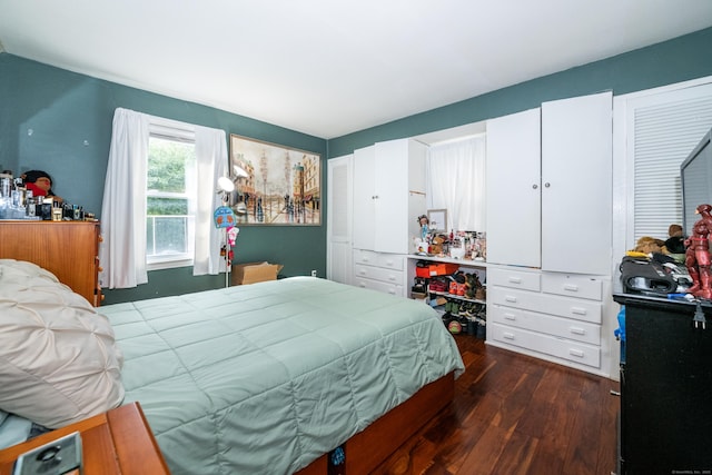 bedroom featuring dark hardwood / wood-style floors