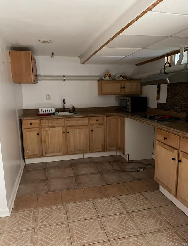 kitchen featuring sink and white gas cooktop