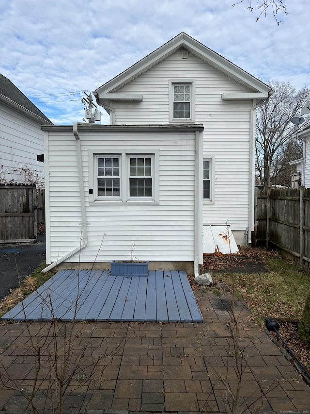 rear view of house featuring a patio area