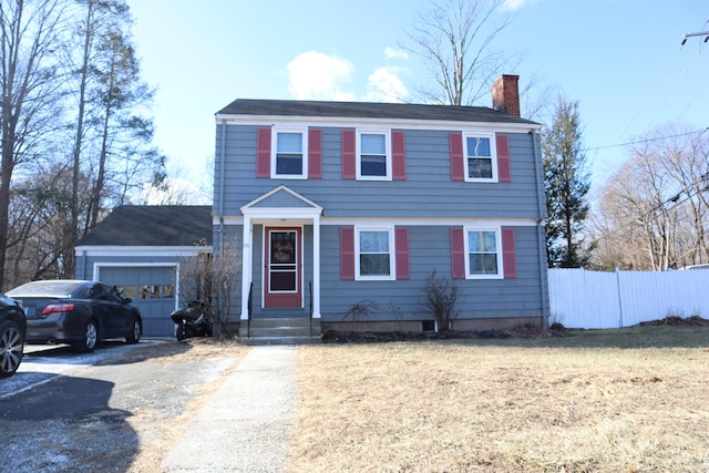 colonial house featuring a garage