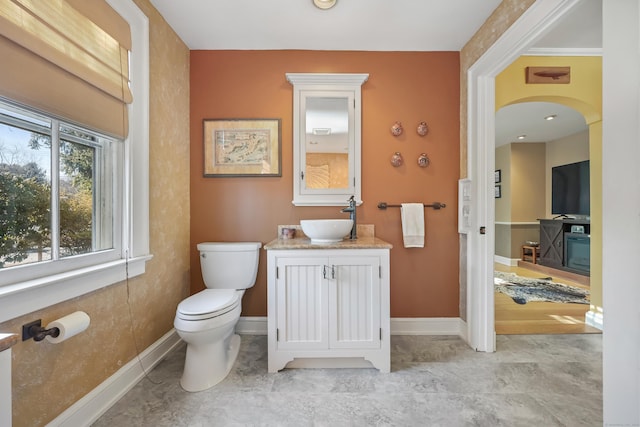 6264 Main St, Trumbull, CT 06611 - bathroom with toilet, baseboards, and vanity