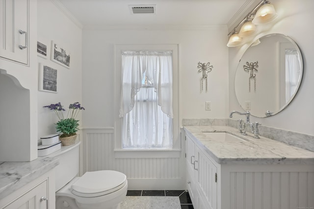 6264 Main St, Trumbull, CT 06611 - bathroom featuring a wainscoted wall, plenty of natural light, toilet, vanity, and tile patterned floors