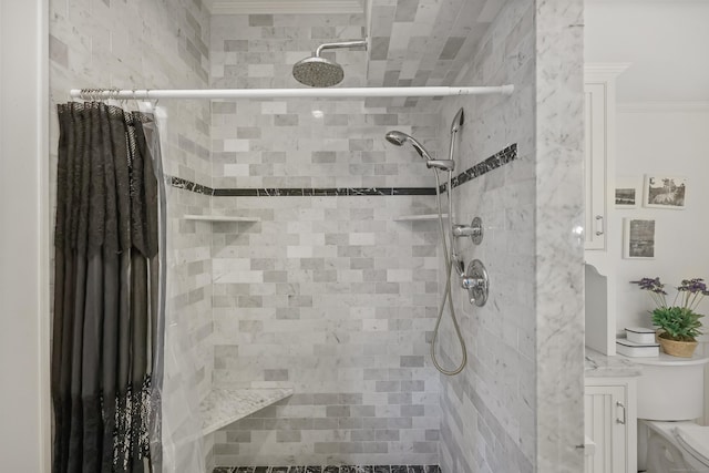 6264 Main St, Trumbull, CT 06611 - bathroom with toilet, tiled shower, and ornamental molding